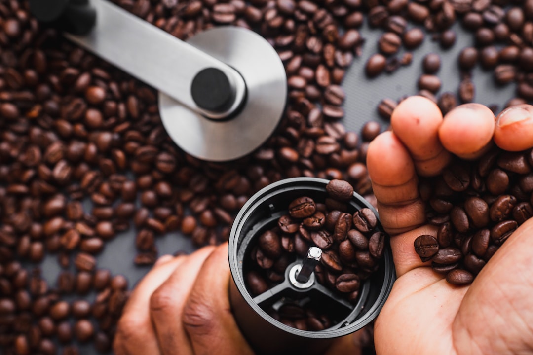 Coffee beans in black cup