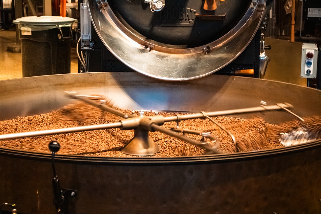 Coffee beans are being roasted inside the machine.